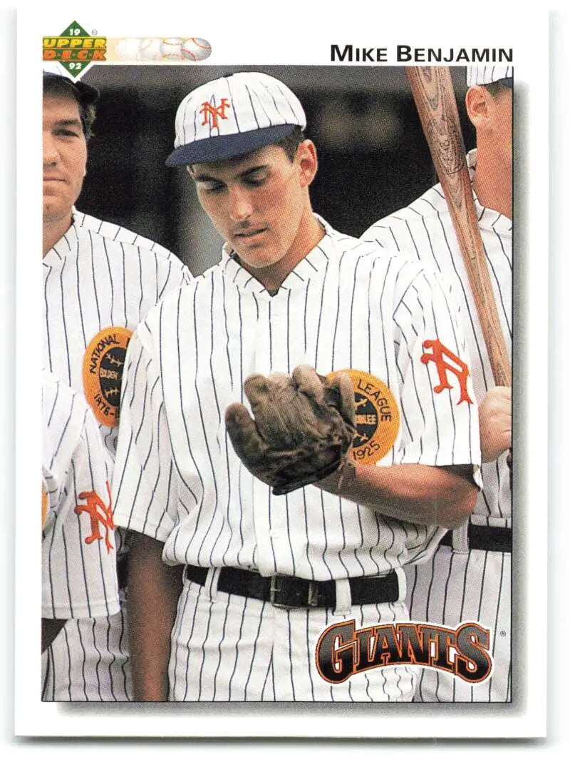 Baseball card of Mike Benjamin in pinstriped San Francisco Giants uniform with glove