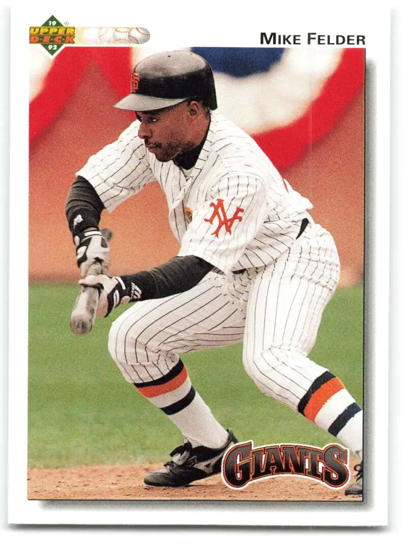 Baseball card of Mike Felder in pinstriped uniform for San Francisco Giants