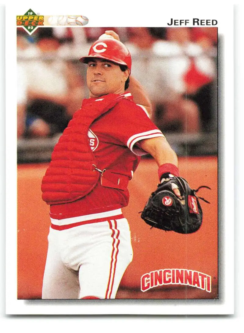 Cincinnati Reds player Jeff Reed holding a catcher’s mitt in 1992 Upper Deck card