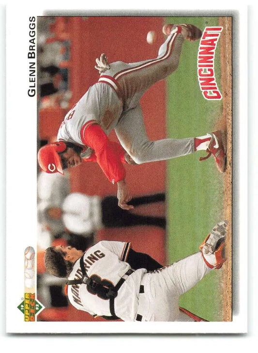 Glenn Braggs sliding into base in a thrilling play, captured on his Upper Deck baseball card