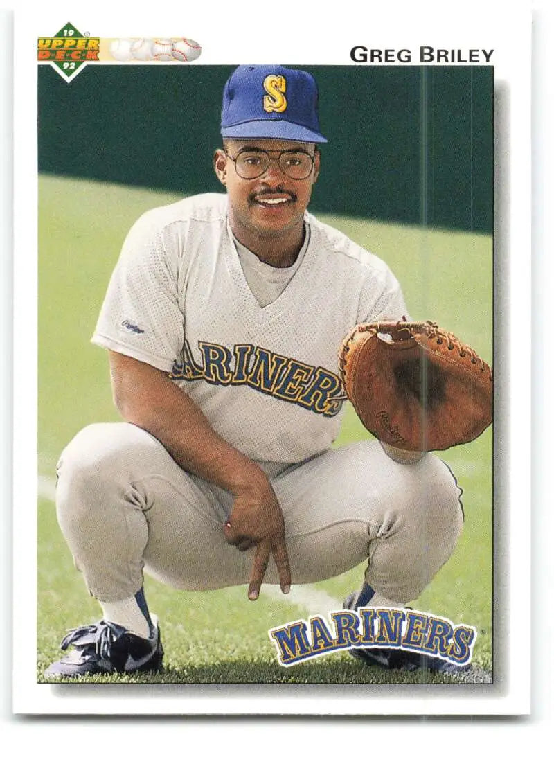 Greg Briley in Seattle Mariners uniform crouching with a glove on baseball card
