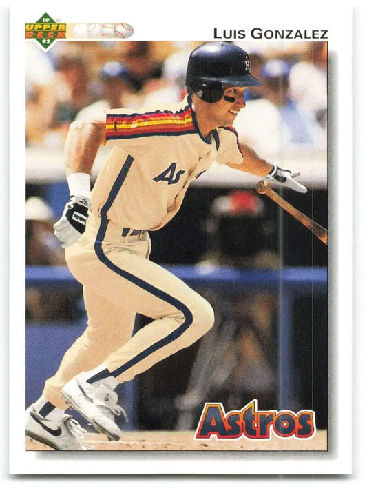 Luis Gonzalez swings in a white and navy uniform on a 1992 Upper Deck Astros card