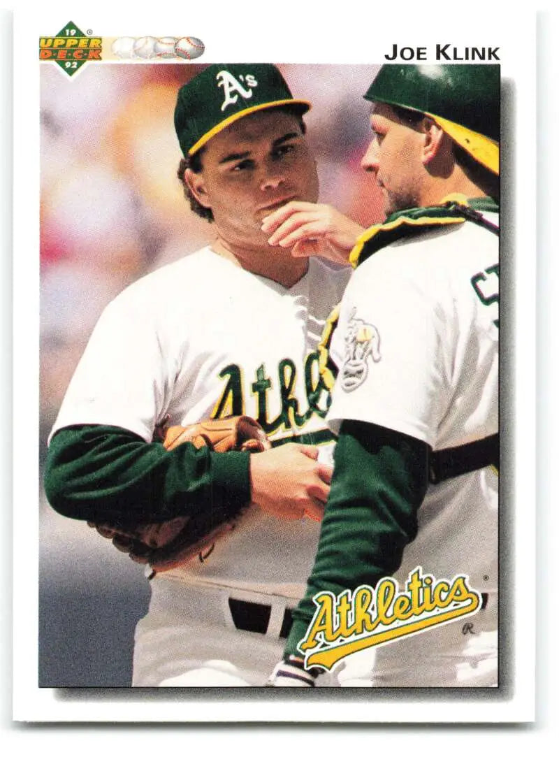 Baseball card of Joe Klink and Oakland Athletics sharing a moment in 1992 Upper Deck