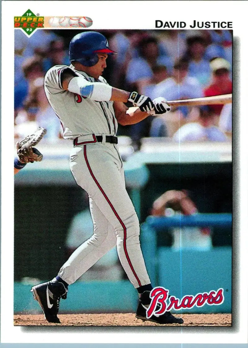 David Justice swinging bat in Atlanta Braves uniform on baseball card