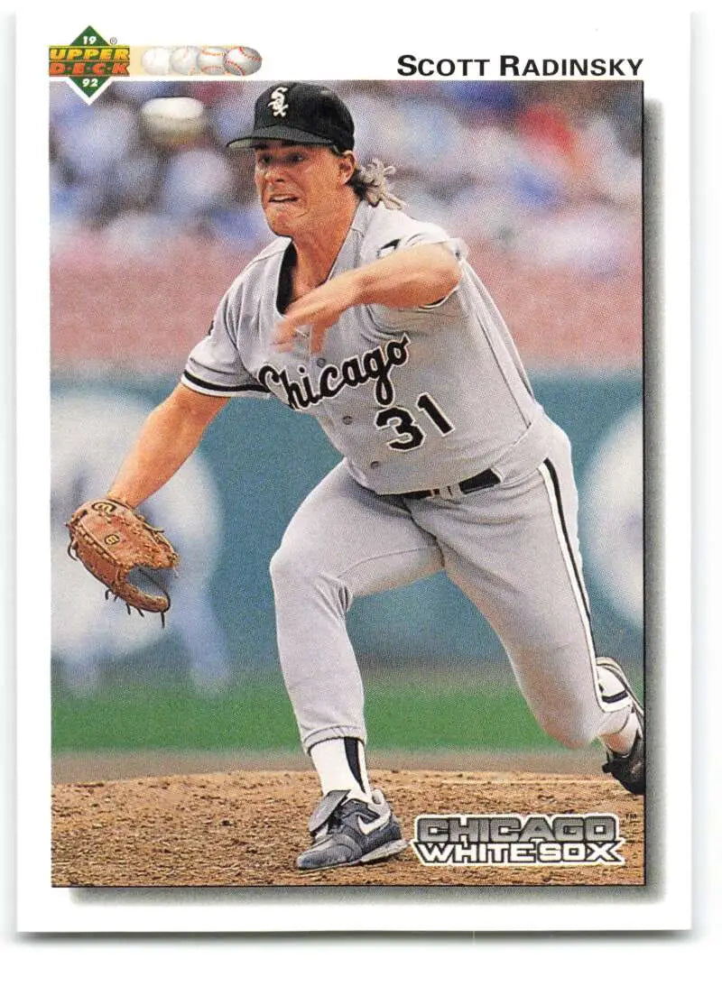 Baseball card of Chicago White Sox pitcher Scott Radinsky in mid-throw, number 31