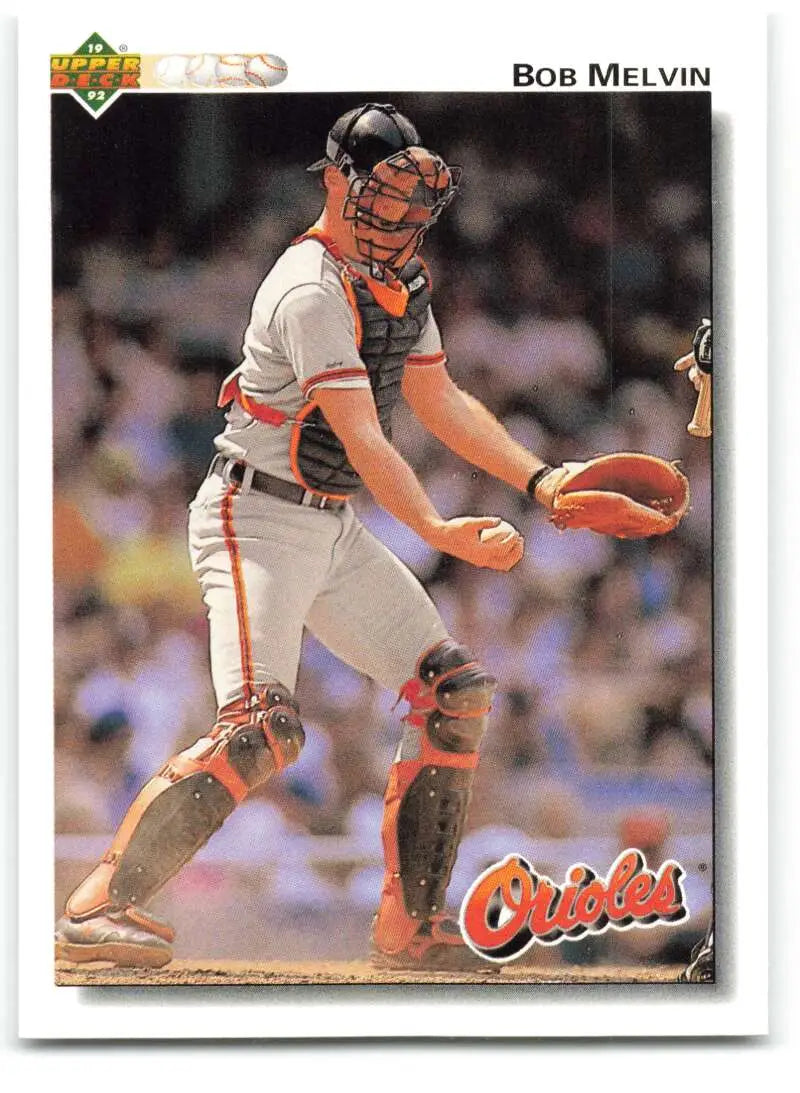 Baseball catcher Bob Melvin in Orioles uniform making a play on 1992 card