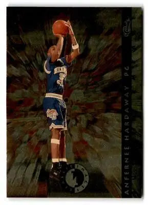 Anfernee Hardaway in dark blue uniform taking jump shot Classic Images Four Sport