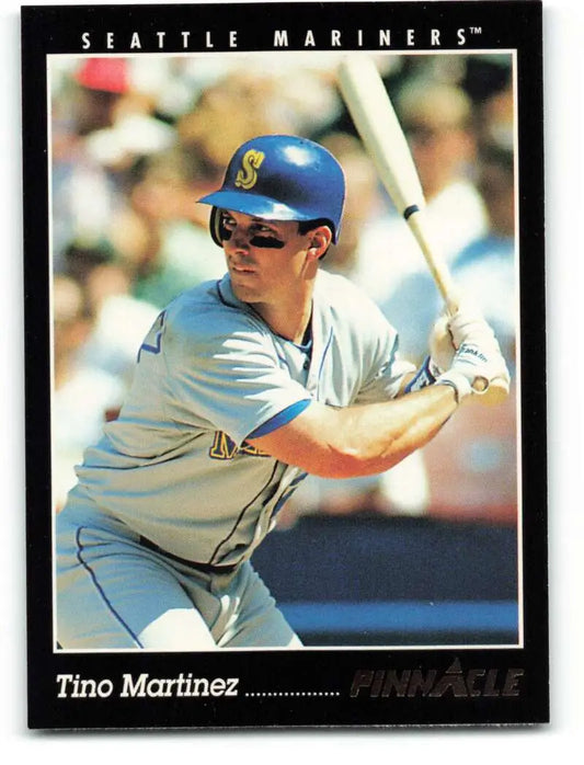 Seattle Mariners baseball card of Tino Martinez at bat in white uniform