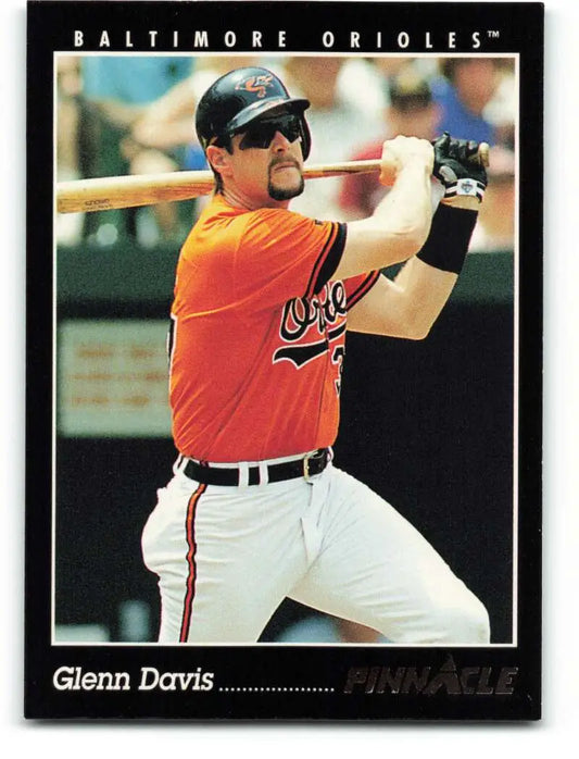Baseball card of Glenn Davis in orange jersey for Baltimore Orioles at bat
