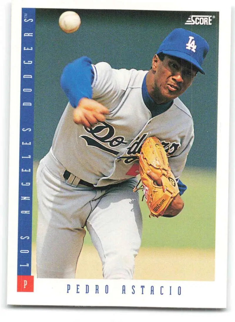 Baseball card of Pedro Astacio throwing for the Los Angeles Dodgers in gray uniform