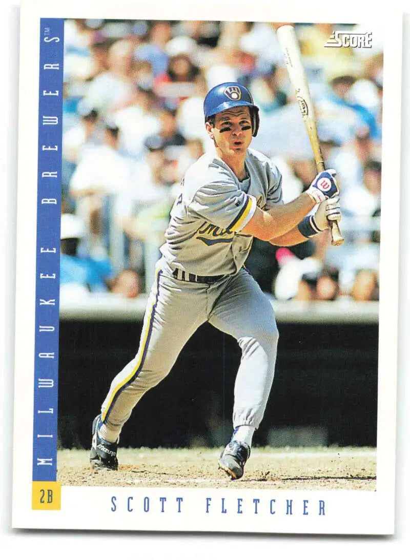 Scott Fletcher hitting in gray road uniform on 1993 Score Milwaukee Brewers baseball card