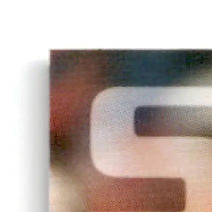 Textured color-shifting letter E with shadow from Skybox Football Impact Steve Young card