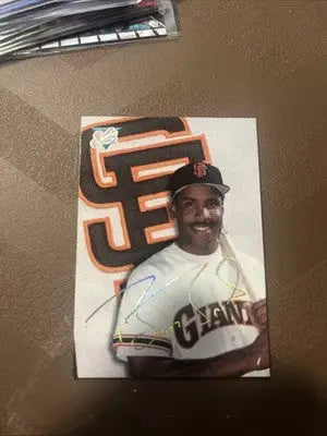 Signed Barry Bonds trading card from 1993 Studio featuring a smiling player in Giants uniform