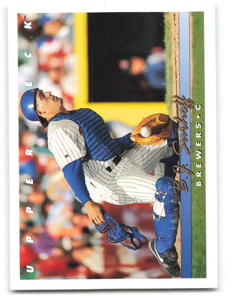 Baseball catcher in blue helmet and pinstriped uniform for Milwaukee Brewers Upper Deck card