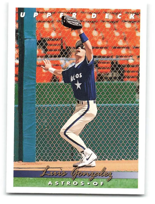 A baseball card of Luis Gonzalez making a leaping catch for the Houston Astros