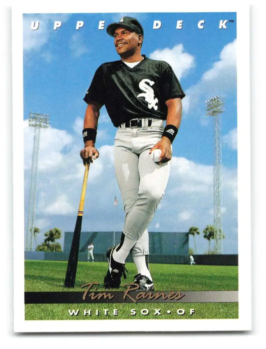 Baseball player Tim Raines in Chicago White Sox uniform holding a bat