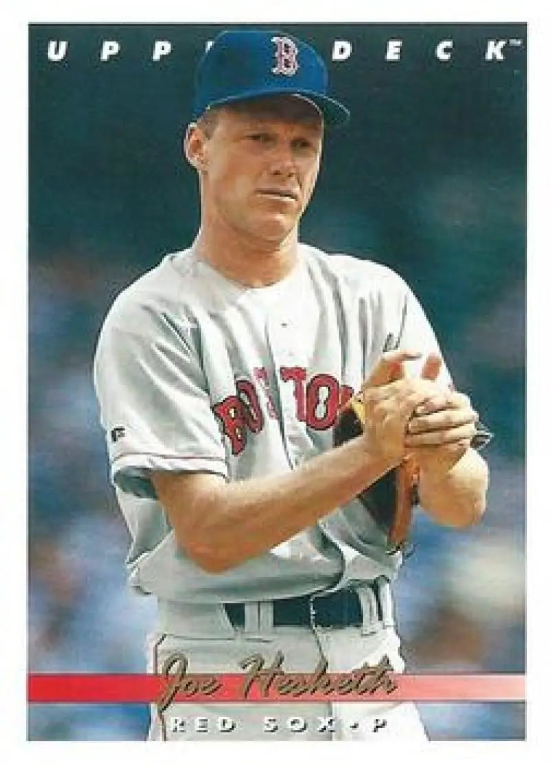 Baseball player Joe Hesketh in Boston Red Sox uniform preparing to pitch