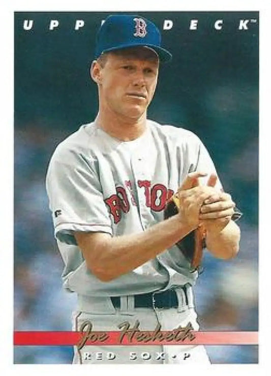 Baseball player Joe Hesketh in Boston Red Sox uniform preparing to pitch