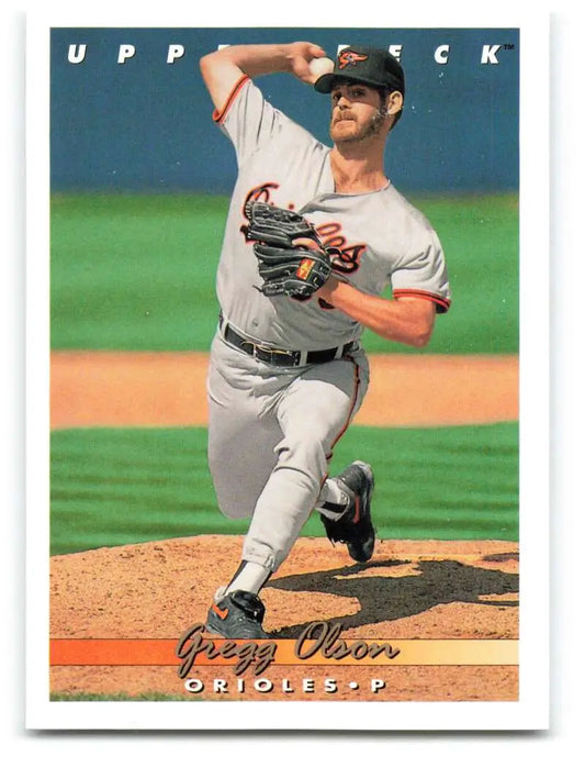 Gregg Olson pitching on the mound in a gray uniform, Baltimore Orioles baseball card