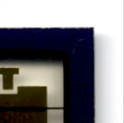 Fragment of dark blue framed edge Steve Young Boss Squad Silver collectible card with gold T