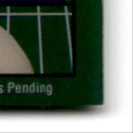 Corner of a green playing card with white markings from 1994 Collector’s Edge Steve Young Boss Squad Silver series