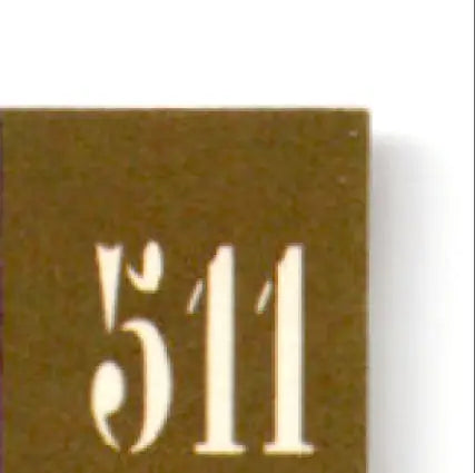 Brown rectangular object with 511 printed, part of Topps Football Stadium Club Steve Young collection
