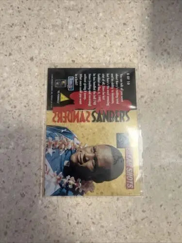 Deion Sanders trading card from 1995 Pinnacle Barry Sanders Clear Shots Insert