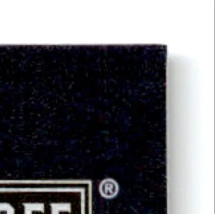 Dark speckled rectangular object with registered trademark symbol from 1995 Playoff Contenders Football Steve Young #1 San Francisco 49ers