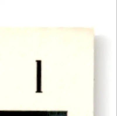 White book cover with black Roman numeral I for 1995 Score Football Steve Young San Francisco 49ers