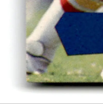 Corner of 1995 Upper Deck Collector’s Choice Steve Young Player’s Club card with white border and blue design