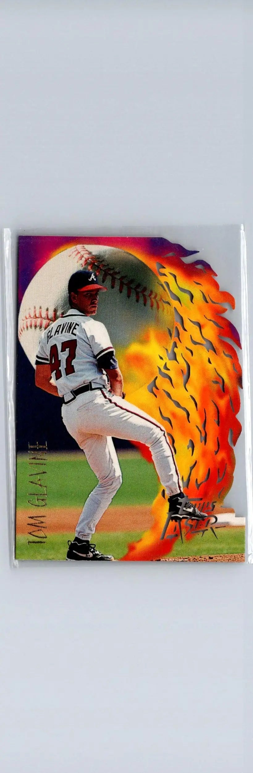 Baseball card featuring pitcher Tom Glavine from 1996 Topps Laser series