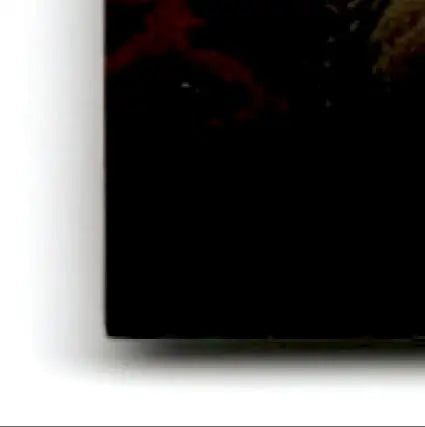 Dark-colored rectangular object with red and gold patterns from 1996 Upper Deck Racing Road to the Cup Bill Elliott #RC7a