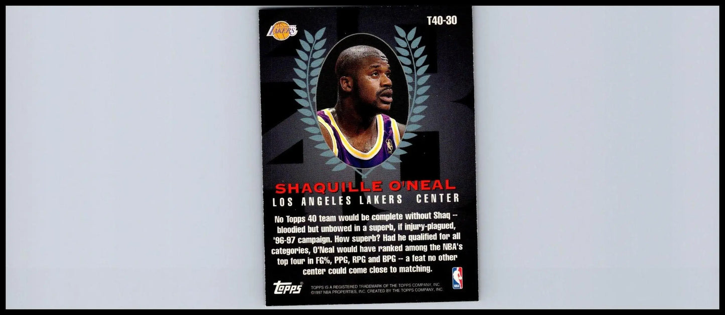 Shaquille O’Neal trading card from 1997-98 Topps collection displayed prominently
