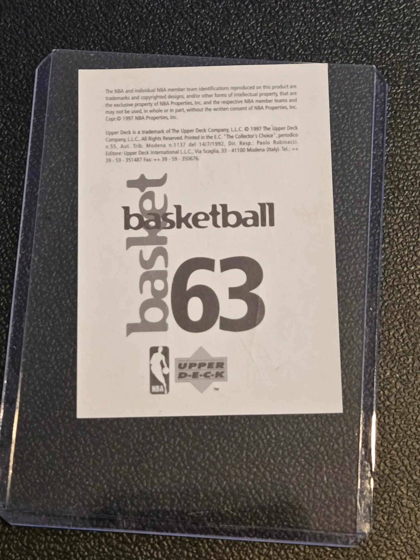 Basketball card in protective case from 1997-98 Upper Deck NBA Stickers featuring Shaquille ONeal