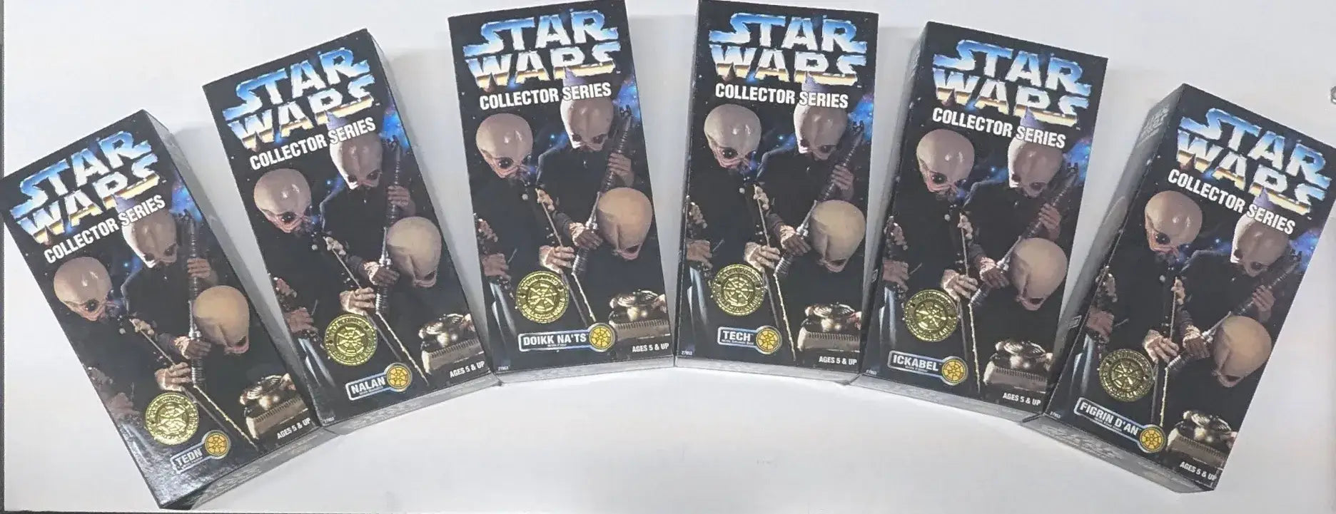Star Wars action figure boxes from the 1997 Hasbro Star Wars Collector Series Cantina Band Set