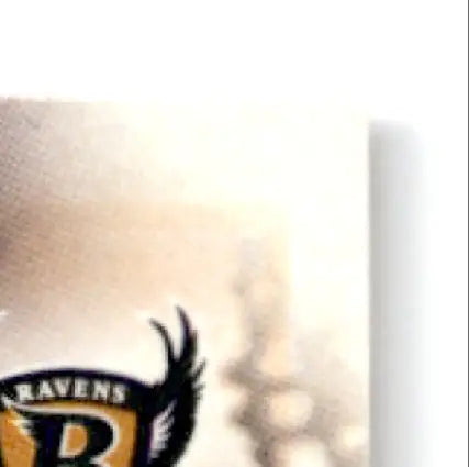 Baltimore Ravens logo with black raven head and gold R on Leaf Football Derrick Alexander