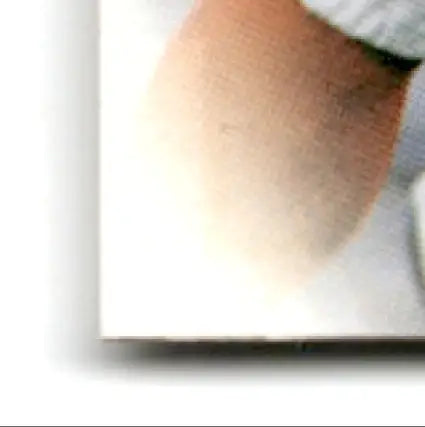 Close-up of a person’s skin showcasing the Leaf Football Eric Moulds #78 Buffalo Bills collectible