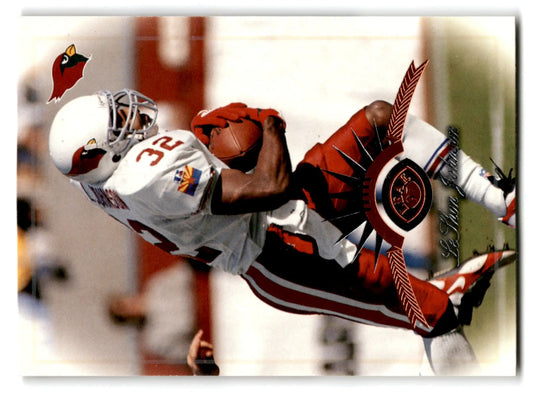 Leaf Football Leshon Johnson action shot of a player diving to catch a football