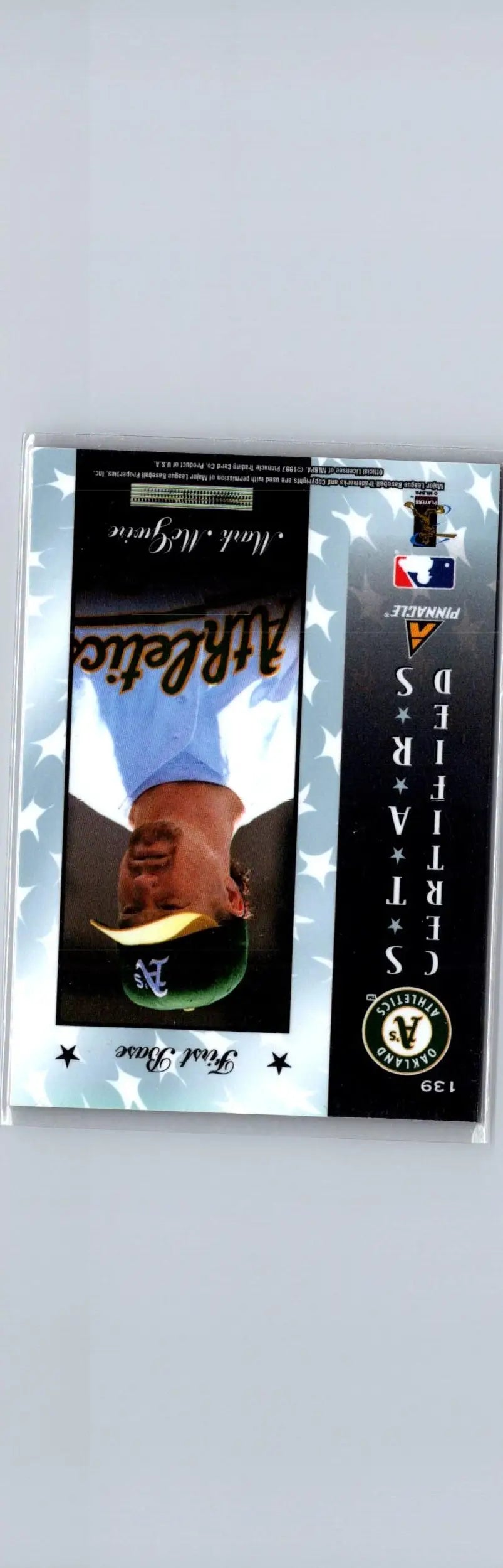 Baseball card featuring Mark McGwire in Oakland Athletics uniform from 1997 Pinnacle Certified Red