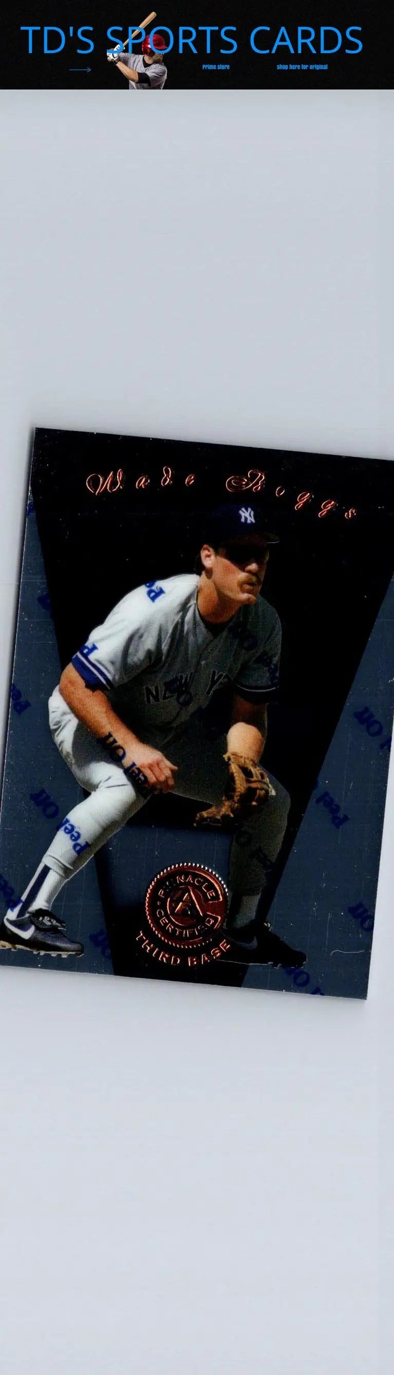 Collectible Wade Boggs baseball card from Pinnacle Certified series featuring player in crouching pose