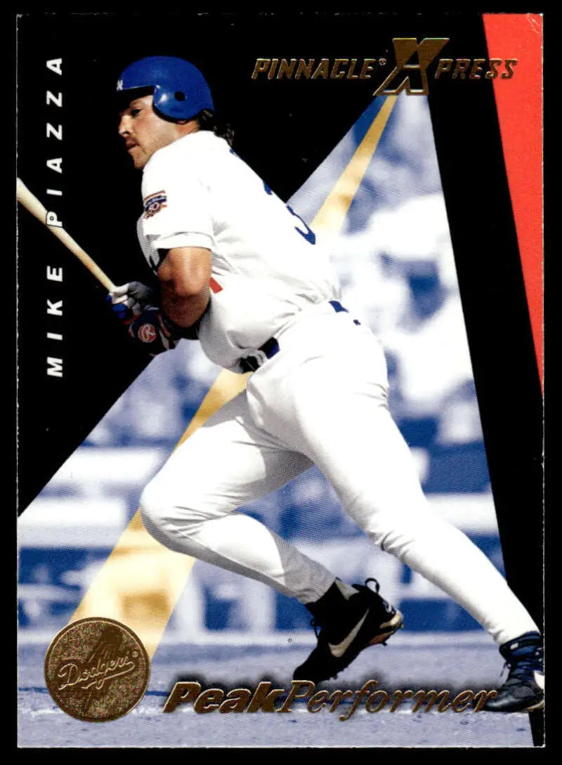 Mike Piazza swinging bat in white uniform on 1997 Pinnacle X-Press baseball card
