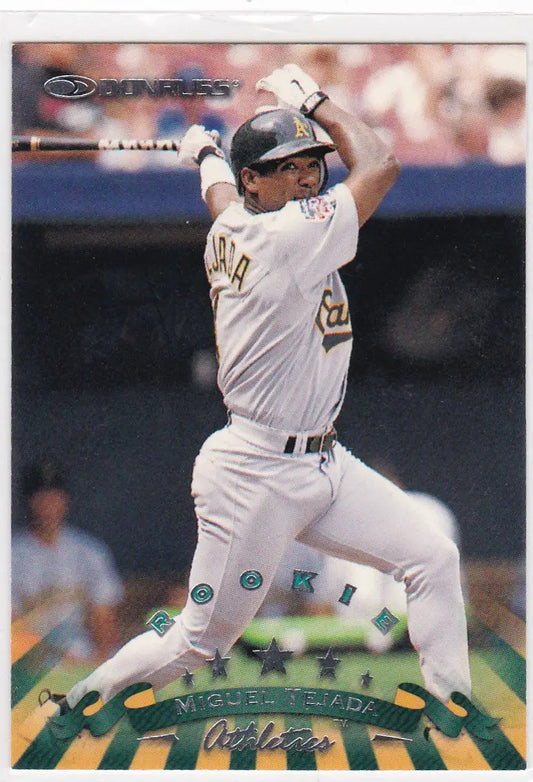 Miguel Tejada RC Rookie card showcasing Oakland Athletics player swinging a bat