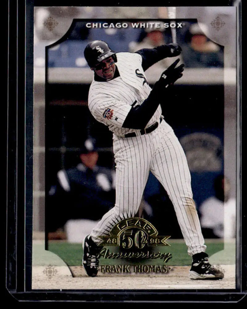 Baseball card of Frank Thomas NM-MT in pinstriped uniform swinging bat