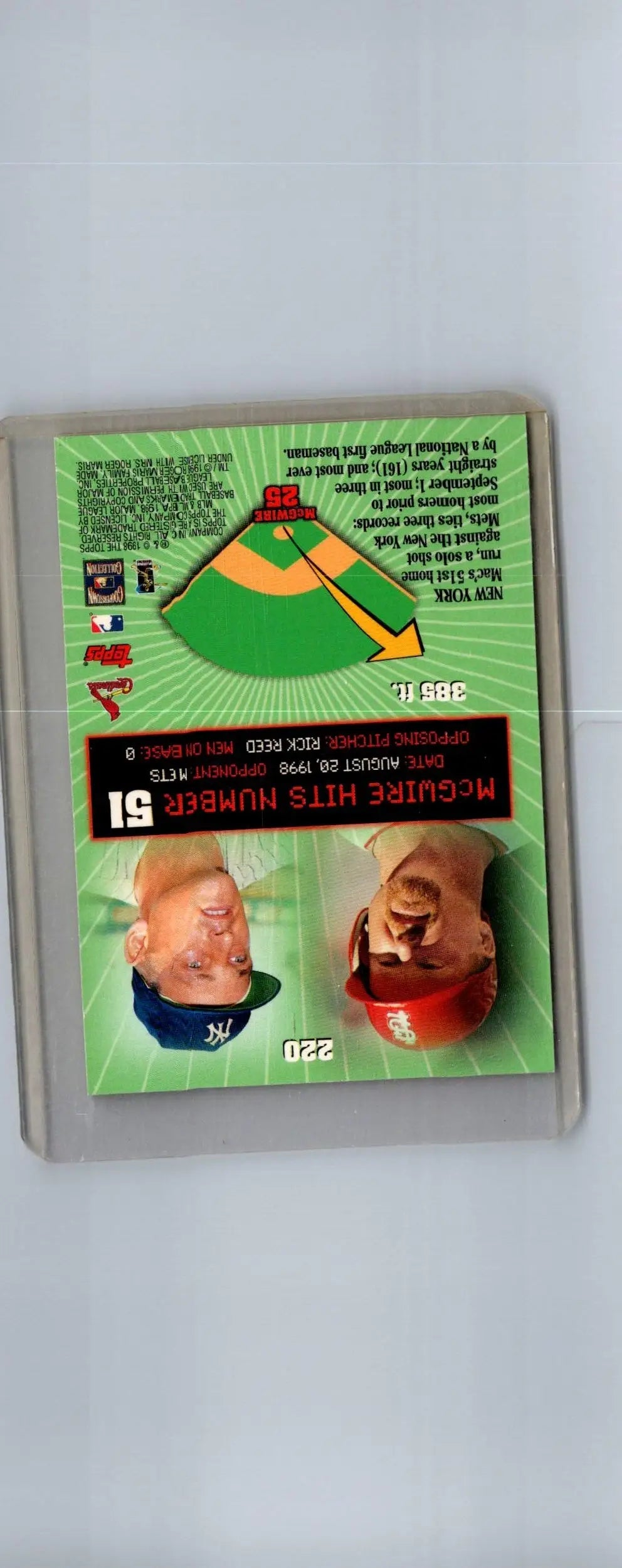 Back of 1999 Topps 220ay Mark McGwire HR 51 trading card with players and field diagram