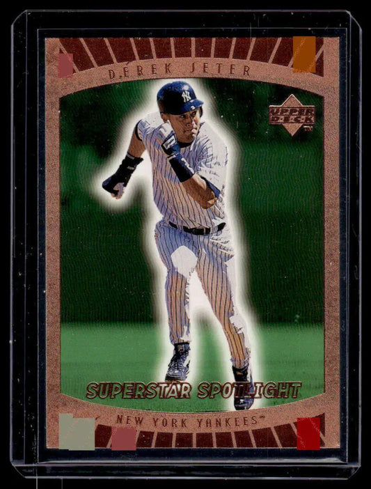 Derek Jeter 1999 Upper Deck Superstar Spotlight baseball card featuring Yankees pinstripe uniform
