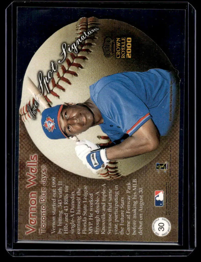 Baseball card featuring Vernon Wells in Toronto Blue Jays uniform, 2000 Pacific Crown Royale