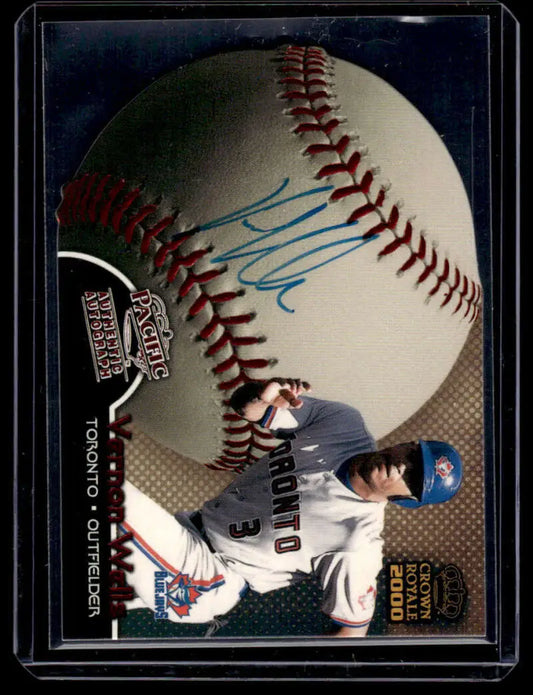 Baseball with red stitching and blue signature on Vernon Wells Toronto Blue Jays card