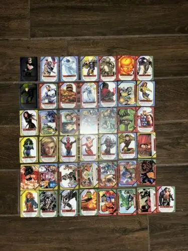 Marvel trading cards collection featuring 2001 Marvel Recharge and foil cards Cyclops Angel