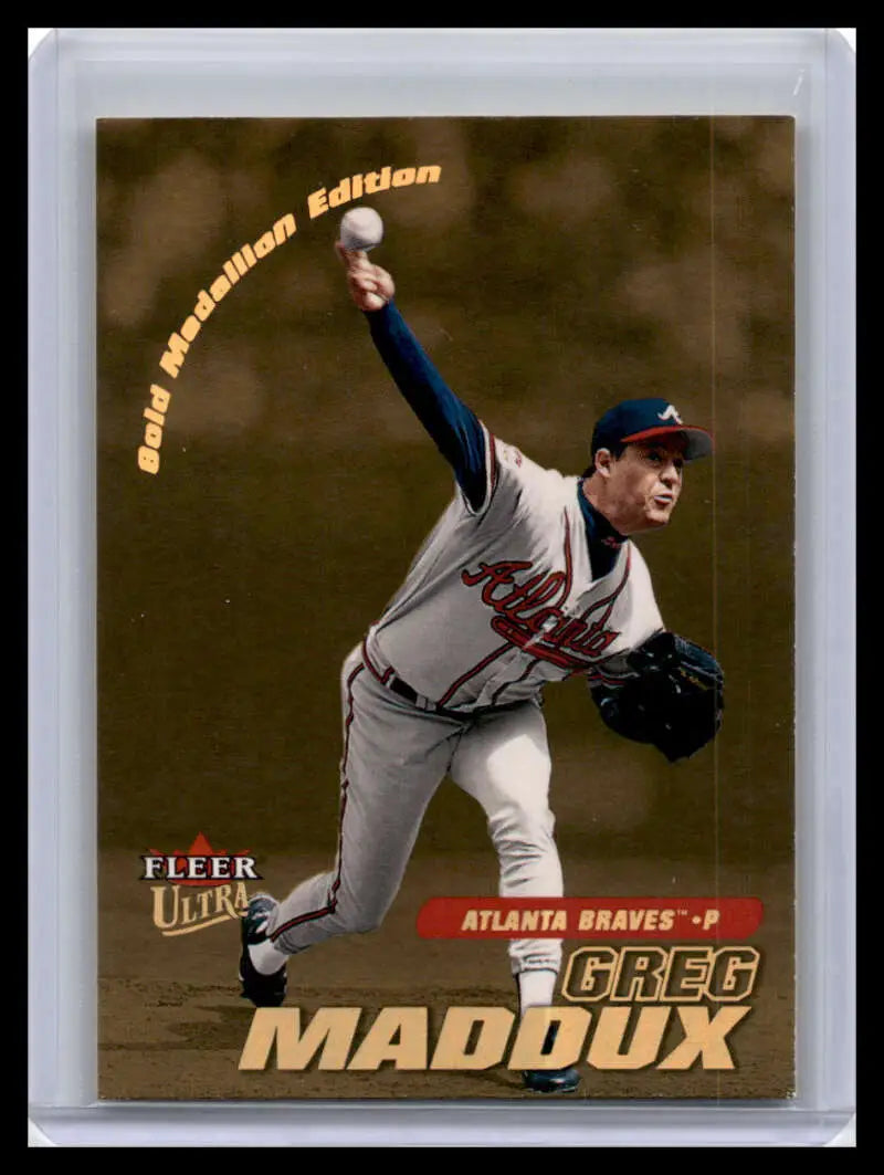 Greg Maddux mid-throwing in white uniform on 2001 Ultra Atlanta Braves Baseball Card