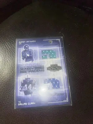 Byron Leftwich and Dallas Clark jersey card from 2003 Playoff Honors Tandems collection
